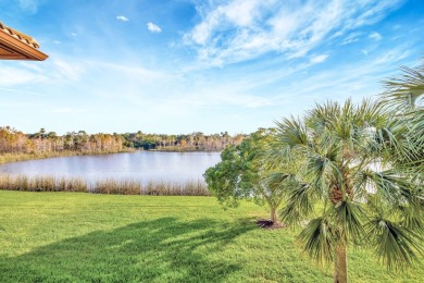 SPECTACULAR VIEW OF WIDE LAKE AND PRESERVE IN THIS  SPACIOUS AND on Jupiter Country Club in Florida - for sale on GolfHomes.com, golf home, golf lot