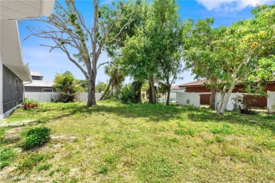 This stunning Renovated home IS STURDY AS STEEL AND NOTHING TO on Port Charlotte Golf Club in Florida - for sale on GolfHomes.com, golf home, golf lot