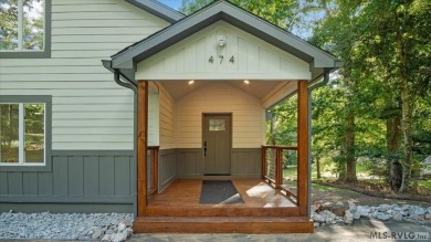 Completely remodeled inside and out, this 3-bedroom, 3-bath home on Tanglewood Shores Golf Club in Virginia - for sale on GolfHomes.com, golf home, golf lot