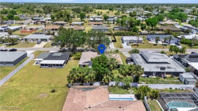 This stunning Renovated home IS STURDY AS STEEL AND NOTHING TO on Port Charlotte Golf Club in Florida - for sale on GolfHomes.com, golf home, golf lot