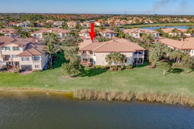 SPECTACULAR VIEW OF WIDE LAKE AND PRESERVE IN THIS  SPACIOUS AND on Jupiter Country Club in Florida - for sale on GolfHomes.com, golf home, golf lot