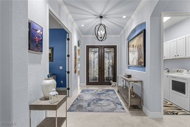 An entertainers dream home situated on a 1/3 acre lot with views on Pelican Preserve Golf Club in Florida - for sale on GolfHomes.com, golf home, golf lot