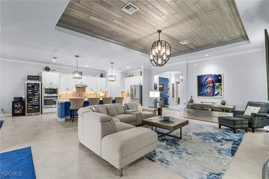 An entertainers dream home situated on a 1/3 acre lot with views on Pelican Preserve Golf Club in Florida - for sale on GolfHomes.com, golf home, golf lot