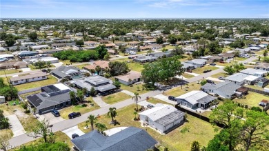 This stunning Renovated home IS STURDY AS STEEL AND NOTHING TO on Port Charlotte Golf Club in Florida - for sale on GolfHomes.com, golf home, golf lot