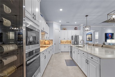 An entertainers dream home situated on a 1/3 acre lot with views on Pelican Preserve Golf Club in Florida - for sale on GolfHomes.com, golf home, golf lot