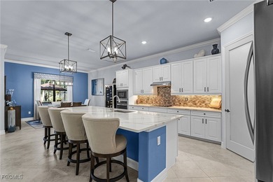 An entertainers dream home situated on a 1/3 acre lot with views on Pelican Preserve Golf Club in Florida - for sale on GolfHomes.com, golf home, golf lot