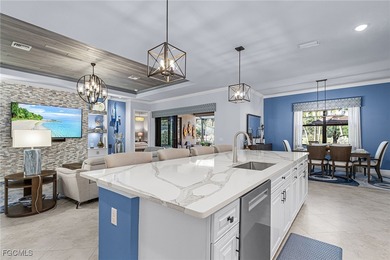 An entertainers dream home situated on a 1/3 acre lot with views on Pelican Preserve Golf Club in Florida - for sale on GolfHomes.com, golf home, golf lot