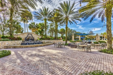 SPECTACULAR VIEW OF WIDE LAKE AND PRESERVE IN THIS  SPACIOUS AND on Jupiter Country Club in Florida - for sale on GolfHomes.com, golf home, golf lot