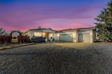 Welcome to this incredible custom home, nestled on a full-acre on Santa Fe Country Club in New Mexico - for sale on GolfHomes.com, golf home, golf lot