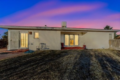 Welcome to this incredible custom home, nestled on a full-acre on Santa Fe Country Club in New Mexico - for sale on GolfHomes.com, golf home, golf lot