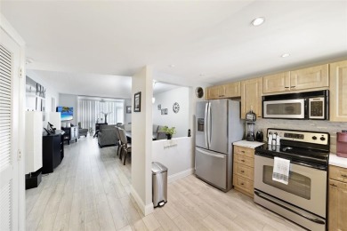 Beautifully remodeled 2-bedroom, 2-bath unit on the 1st floor on Sunrise Lakes Phase IV Golf Course in Florida - for sale on GolfHomes.com, golf home, golf lot