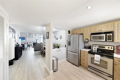 Beautifully remodeled 2-bedroom, 2-bath unit on the 1st floor on Sunrise Lakes Phase IV Golf Course in Florida - for sale on GolfHomes.com, golf home, golf lot