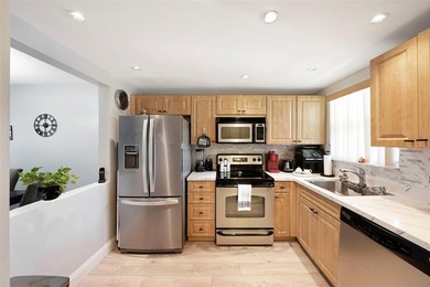 Beautifully remodeled 2-bedroom, 2-bath unit on the 1st floor on Sunrise Lakes Phase IV Golf Course in Florida - for sale on GolfHomes.com, golf home, golf lot