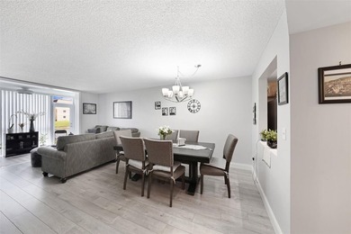 Beautifully remodeled 2-bedroom, 2-bath unit on the 1st floor on Sunrise Lakes Phase IV Golf Course in Florida - for sale on GolfHomes.com, golf home, golf lot