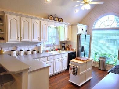 Exceptionally maintained brick home in the Wyboo Plantation on Players Course At Wyboo Plantation in South Carolina - for sale on GolfHomes.com, golf home, golf lot