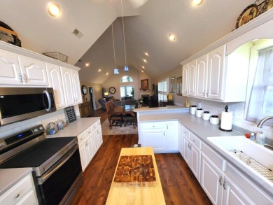 Exceptionally maintained brick home in the Wyboo Plantation on Players Course At Wyboo Plantation in South Carolina - for sale on GolfHomes.com, golf home, golf lot