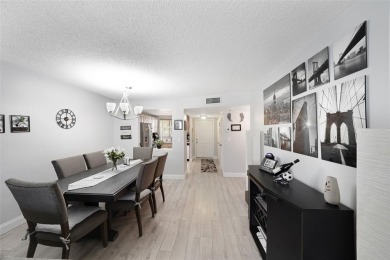 Beautifully remodeled 2-bedroom, 2-bath unit on the 1st floor on Sunrise Lakes Phase IV Golf Course in Florida - for sale on GolfHomes.com, golf home, golf lot