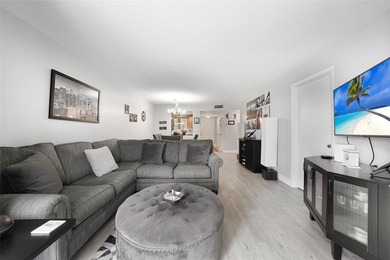 Beautifully remodeled 2-bedroom, 2-bath unit on the 1st floor on Sunrise Lakes Phase IV Golf Course in Florida - for sale on GolfHomes.com, golf home, golf lot