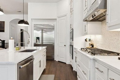 Welcome to this stunning Highland home in the highly on The Tribute At the Colony in Texas - for sale on GolfHomes.com, golf home, golf lot