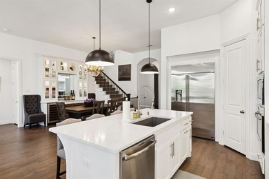 Welcome to this stunning Highland home in the highly on The Tribute At the Colony in Texas - for sale on GolfHomes.com, golf home, golf lot