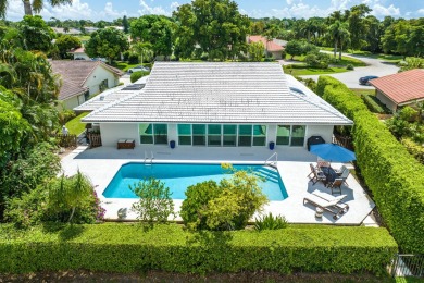 A beautiful blend of whites and woods adorn the entirety of the on Hamlet Country Club in Florida - for sale on GolfHomes.com, golf home, golf lot