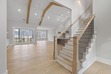 Stunning new construction in Harbor Club featuring the luxury on Harbor Club Golf and Country Club in Georgia - for sale on GolfHomes.com, golf home, golf lot