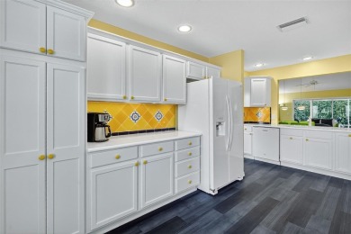 This bright and cheerful, Designer Wisteria, offers 3 bedrooms on The Links of Spruce Creek in Florida - for sale on GolfHomes.com, golf home, golf lot