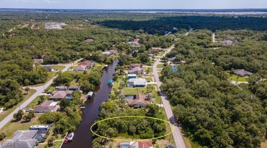 Build your dream home on this stunning waterfront lot in Port on Sabal Trace Golf and Country Club in Florida - for sale on GolfHomes.com, golf home, golf lot