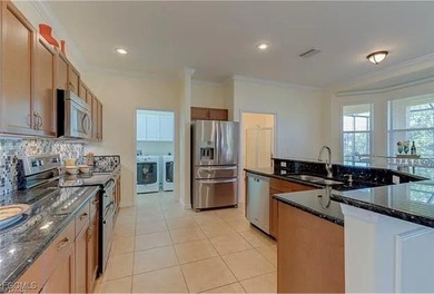 Lakefront Luxury in Westminster Golf & Country Club - No Flood on Westminster Golf Club in Florida - for sale on GolfHomes.com, golf home, golf lot