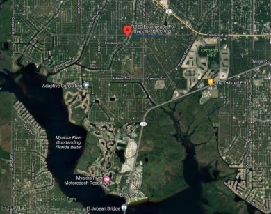Build your dream home on this stunning waterfront lot in Port on Sabal Trace Golf and Country Club in Florida - for sale on GolfHomes.com, golf home, golf lot