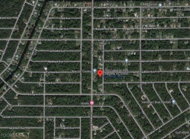 Build your dream home on this ideally located lot nestled on Sabal Trace Golf and Country Club in Florida - for sale on GolfHomes.com, golf home, golf lot