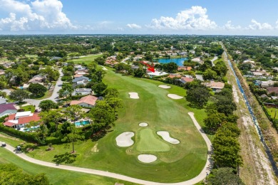 A beautiful blend of whites and woods adorn the entirety of the on Hamlet Country Club in Florida - for sale on GolfHomes.com, golf home, golf lot