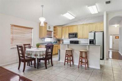 Beautiful well-maintained home on a gorgeous golf course lot in on Heritage Isles Golf and Country Club in Florida - for sale on GolfHomes.com, golf home, golf lot