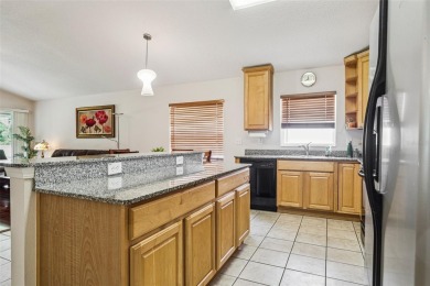Beautiful well-maintained home on a gorgeous golf course lot in on Heritage Isles Golf and Country Club in Florida - for sale on GolfHomes.com, golf home, golf lot