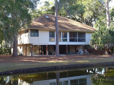 Desirable Duplex Style villa overlooking a scenic pond in gated on The Plantation Course At Edisto in South Carolina - for sale on GolfHomes.com, golf home, golf lot