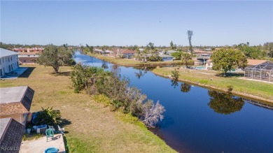 Quadruple your income with this fully rented WATERFRONT QUADPLEX on Rotonda Golf and Country Club The Hills Course in Florida - for sale on GolfHomes.com, golf home, golf lot