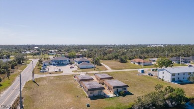 Quadruple your income with this fully rented WATERFRONT QUADPLEX on Rotonda Golf and Country Club The Hills Course in Florida - for sale on GolfHomes.com, golf home, golf lot