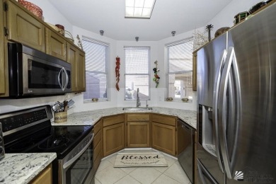 Welcome to this inviting 2-bedroom, 2-bath townhome, where each on Mesa Del Sol Golf Club in Arizona - for sale on GolfHomes.com, golf home, golf lot