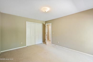 Opportunity awaits on the 7th tee! This spacious home in the on Olde Point Golf and Country Club in North Carolina - for sale on GolfHomes.com, golf home, golf lot