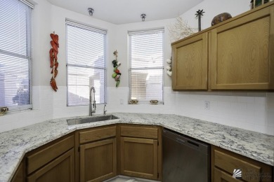 Welcome to this inviting 2-bedroom, 2-bath townhome, where each on Mesa Del Sol Golf Club in Arizona - for sale on GolfHomes.com, golf home, golf lot