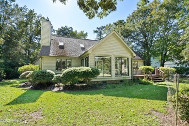 Opportunity awaits on the 7th tee! This spacious home in the on Olde Point Golf and Country Club in North Carolina - for sale on GolfHomes.com, golf home, golf lot