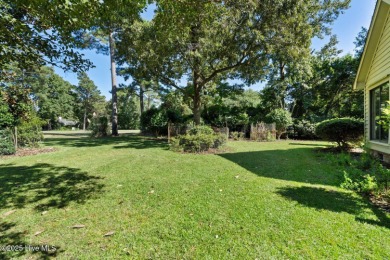 Opportunity awaits on the 7th tee! This spacious home in the on Olde Point Golf and Country Club in North Carolina - for sale on GolfHomes.com, golf home, golf lot