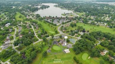 Build your dream home on this beautiful 0.25-acre golf course on Lakes of the Four Seasons Country Club in Indiana - for sale on GolfHomes.com, golf home, golf lot
