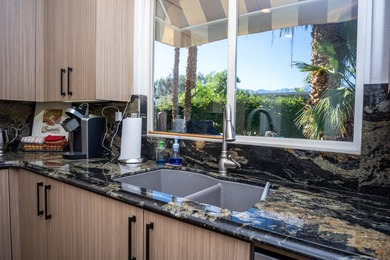 Welcome to refined desert living in the prestigious, gated on Mission Hills Golf Club in California - for sale on GolfHomes.com, golf home, golf lot