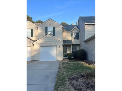 Charming 3-bedroom, 1.5-bathroom water view townhouse in the on Kiln Creek Golf and Country Club in Virginia - for sale on GolfHomes.com, golf home, golf lot