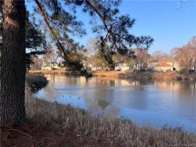 Charming 3-bedroom, 1.5-bathroom water view townhouse in the on Kiln Creek Golf and Country Club in Virginia - for sale on GolfHomes.com, golf home, golf lot