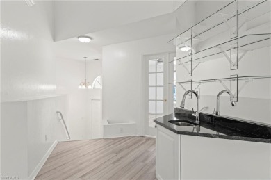 BIG PRICE REDUCTION!  Welcome to this beautifully updated 2BR+ on Audubon Country Club in Florida - for sale on GolfHomes.com, golf home, golf lot