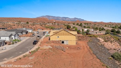 Experience breathtaking views of the city, mountains, and golf on Coral Canyon Golf Course in Utah - for sale on GolfHomes.com, golf home, golf lot