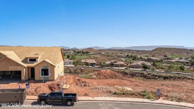 Experience breathtaking views of the city, mountains, and golf on Coral Canyon Golf Course in Utah - for sale on GolfHomes.com, golf home, golf lot