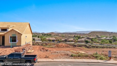 Experience breathtaking views of the city, mountains, and golf on Coral Canyon Golf Course in Utah - for sale on GolfHomes.com, golf home, golf lot